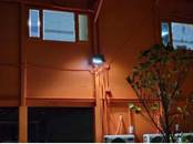 A picture containing window, building, lighting, outdoor

Description automatically generated