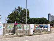 A fence with signs on it

Description automatically generated